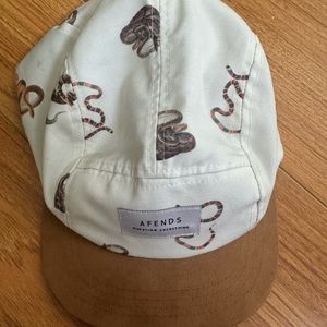 Backward hat with snakes